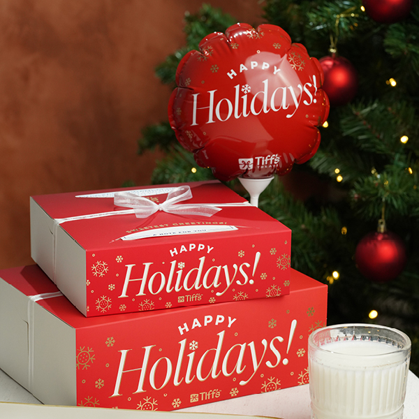 festive holiday gift box and balloon
